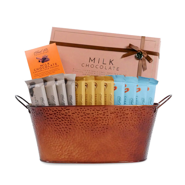 https://www.ethelm.com/cdn/shop/products/emc_giftBasket_milkchocolate_product_final_grande.jpg?v=1657646375